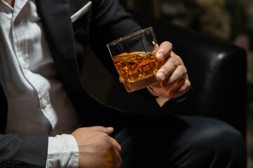 Whisky is poured into glass Beautiful bokeh