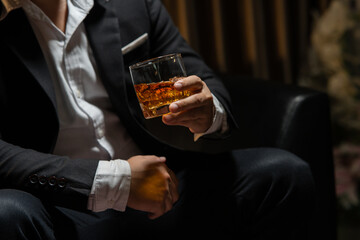 Businessmen in suits drinking  Celebrate whiskey