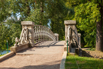 Picturesque stone arched bridge in the park