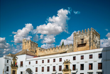 View of the Town Hall of Arcos de La Frontera, Cadiz, Spain, with the castle and its towers in the background