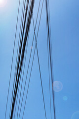 Electrical wires with blue sky for background 