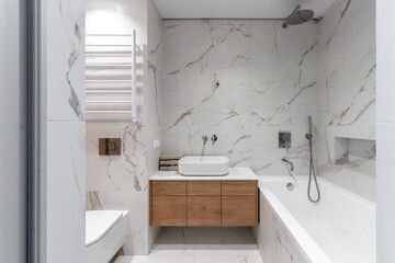 The interior of a modern bathroom in the apartment immediately after renovation