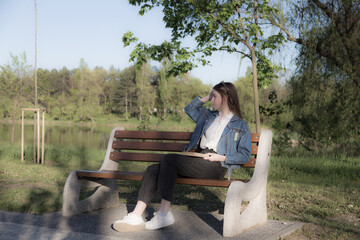 Portrait of a beautiful girl with a book.