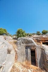 Fototapeta na wymiar Scenic viev of rock tombs in the Limyra, Lycian region. There are more than 400 rock tombs and most of them are known by name through their inscriptions in Lycia