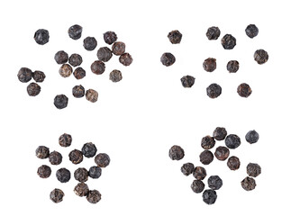 top view close up Heap of black pepper seeds. Spice. Isolated on white background.