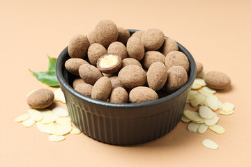 Tasty and sweet food - almonds in chocolate