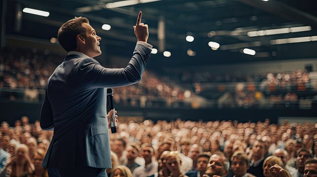 A powerful shot of a business leader addressing a large audience at a conference, showcasing leadership and public speaking