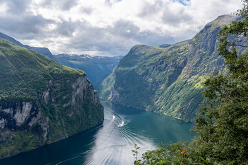 The famouse Geiranger fjord in norway, seen from a mountain road above the clouds