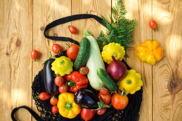 Autumn harvest of vegetables in a mesh bag 