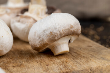 peeled and washed mushrooms while cooking on the table
