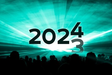 Turn of the year 2023 2024 turquoise laser show party. Luxury entertainment with people crowd audience silhouettes at new year celebration. Premium nightlife event at holidays season time - 640614809