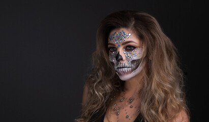  close-up young woman with make-up for the festival Day of the Dead - Dia de los Muertos - a...