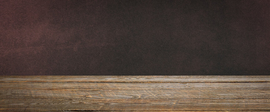 The background is blank wooden boards and a textured plastered wall with lighting and vignetting.