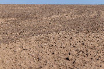 the plowed soil during preparation for sowing agricultural plants