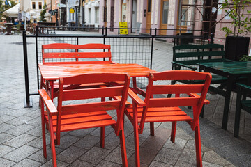 Rain in the city - empty open air terrace cafe in the tourist centre Novi Sad Serbia