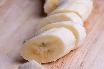Sliced ripe banana on a cutting board