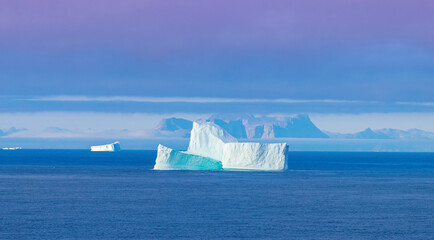 Iceberg seen from cruise ship vacation near Greenland coast in Arctic circle near Ilulissat Disko Bay. - obrazy, fototapety, plakaty