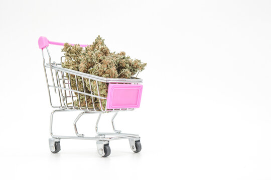 shopping cart full of marijuana buds