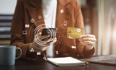 Closeup women holding hand credit card.businessman use smartphone online payments shopping in the morning.