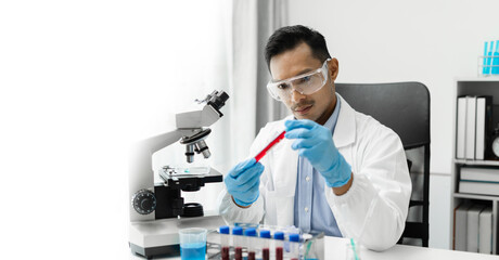 Lab work, Doctor holds a test tube takes the test from a test tube in analysis, blood, DNA, test...