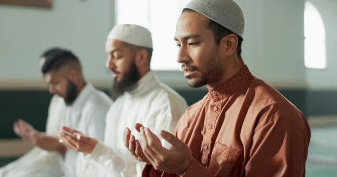 Islamic, praying and men in a Mosque for spiritual religion together as a group to worship Allah in Ramadan. Muslim, Arabic and holy people with peace or respect for gratitude, trust and hope