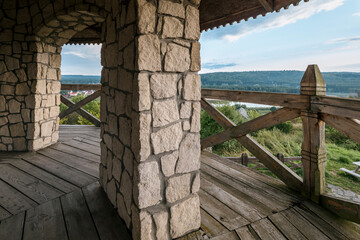 The observation tower in Krasnobrod. View from inside the tower. Stone walls. Forests and floodplains in the background. Roztocze, Poland