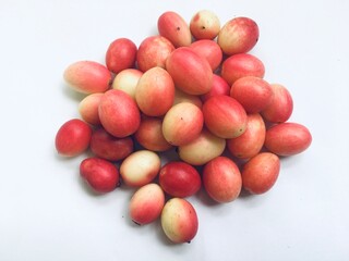 Pile of Bengal currant on white background.