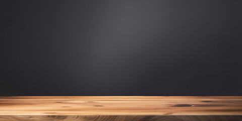 empty wooden table on the black background