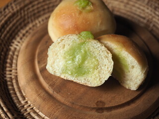 small bread bun with pandan custard filling