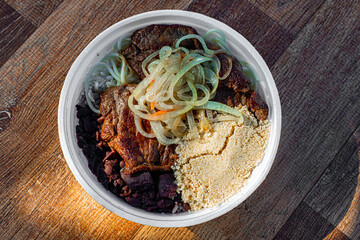 Trade of lunchboxes with typical Brazilian flavor and the basis of Brazilian food: rice and beans
