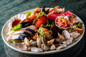Set Seafood with salmon fish, tuna, shrimp, caviar on plate