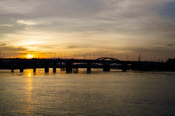 Sunset silhouettes on Binh Trieu bridge in Ho Chi Minh City