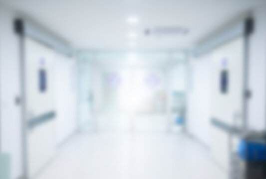 Blurred image of an empty corridor to operating room in hospital.