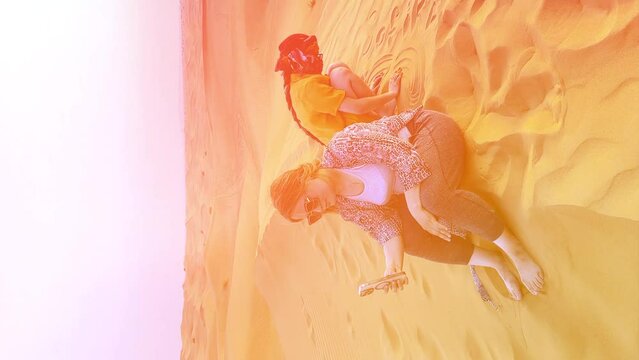 Beautiful woman in the desert during sunset. High quality FullHD footage