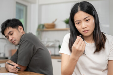 Divorce. Woman remove married ring. Couples desperate and disappointed after marriage. Husband wife sad, upset and frustrated after quarrels conflict. distrust, love problems, betrayals, family