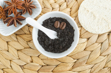 Homemade exfoliating foot and body aroma scrub with ground coffee, olive oil and star anise....