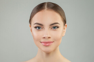 Female beauty. Pretty young woman with healthy fresh skin. Facial treatment, face lifting and skin...