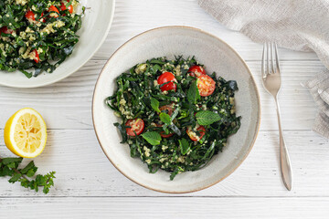 Tabouleh salad with vegetables and herbs