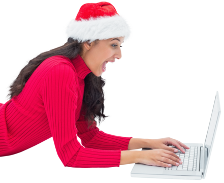 Digital png photo of caucasian woman with santa claus hat using laptop on transparent background