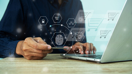 Virtual screen shopping icons online. The concept of a computer, smart phone, credit card, and online transactions merges to redefine convenience and security.