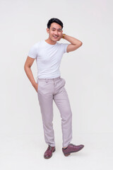 A handsome FIlipino guy in a white shirt and light gray pants. Whole body photo, isolated on a white background.
