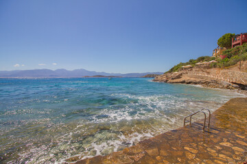 Shore of the turquoise mediterranean sea at the island of Crete, Greece, near Agios Nikolaos, rocky coast