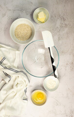 Almond stuffed tart with blueberries jam on top and powdered sugar