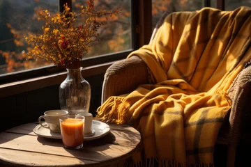 Gordijnen Cozy warm autumn composition with cup of hot tea, burning candle, open book and pumpkins on wooden background. Autumn home decor. Fall mood. Thanksgiving. Halloween. © MNStudio