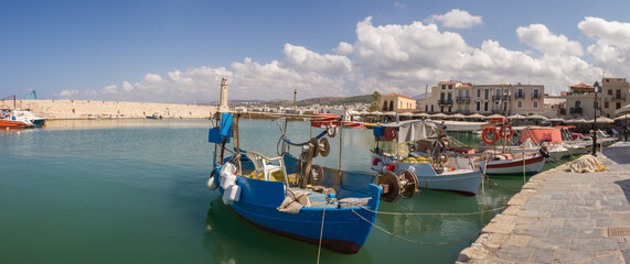 Harbor with boats and Mediterranean Sea at Rethymno, Crete, Greece (panoramic view)