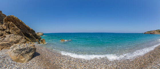 Rocky beach Geropotamos near Rethymno, island of Crete, Mediterranean Sea, Greece (Panorama)
