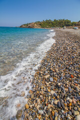 Fototapeta na wymiar Rocky beach Geropotamos near Rethymno, island of Crete, Mediterranean Sea, Greece