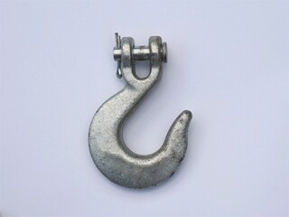 Isolated slip hook on white background. New galvanized steel hook. Cargo lifting and transportation equipment 