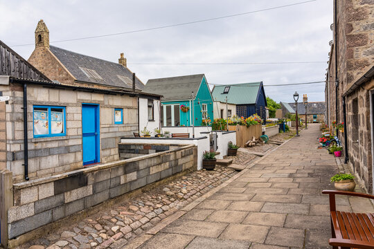Small fishermen's houses by the sea in the neighborhood of Footdee in Aberdeen, Scotland.