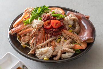 Steamed monkfish, steamed seafood, seafood stew, octopus hot pot Korean food dish